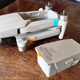 The Mavic Air 2 (without propellers) and its removable battery.